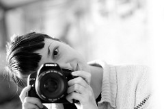 A woman taking a photograph